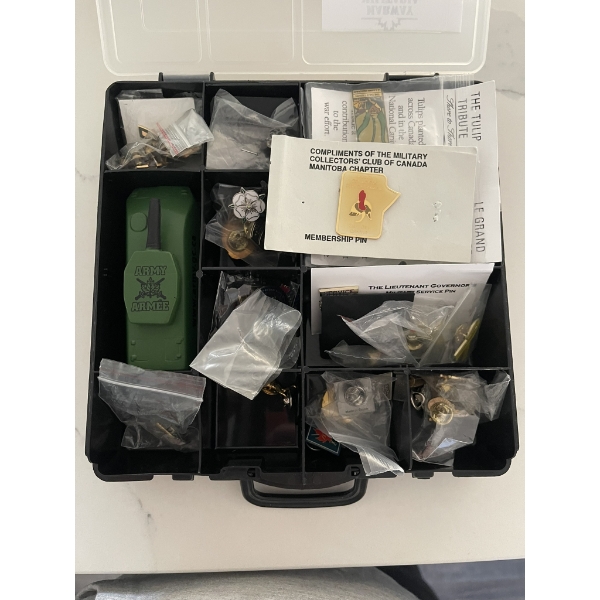 Plastic case of Military Rank insignia, Veterans Affairs pins, and other lapel pins