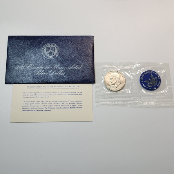 United States Mint 1973 40% Silver Uncirculated Eisenhower Dollar in Original Blue Packaging