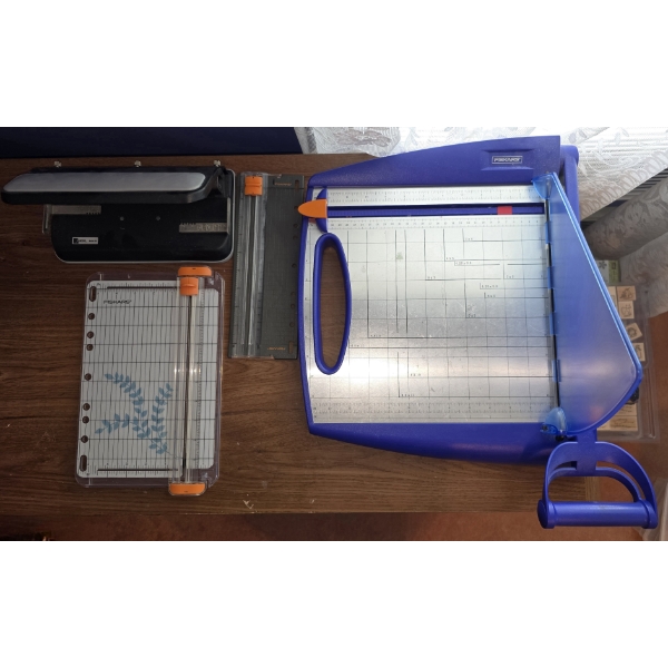 3 Assorted Paper Cutters (Sm, Med, Lg) and a Heavy Duty 3 Hole Punch