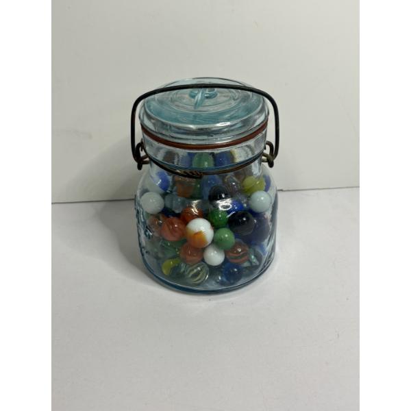Glass Jar Full of Marlbes 