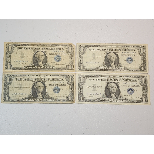 Four U.S. $1 Blue Seal Silver Certificates Series: 1957, 1957-A, 1957-B, 1957-B