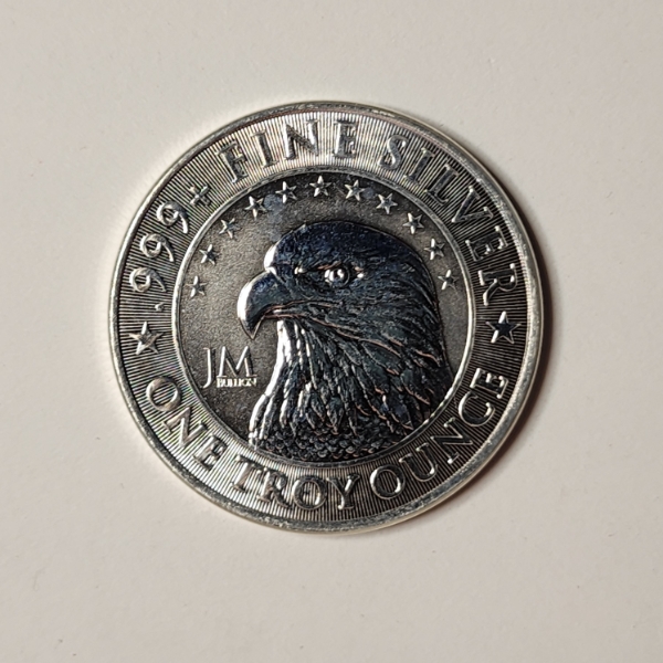 One Troy Ounce .999 Fine Silver JM Bullion Eagle Round