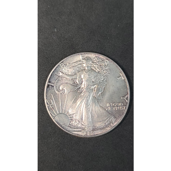 1987 1 Oz .999 Fine Silver American Eagle - Toned