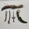 Image 1 : Assortment of Decorative Miniature Weapons, Collectible Replica Daggers, and Letter Openers