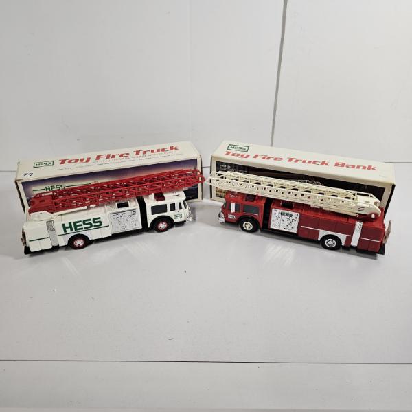 Two Classic Holiday Collectible Vehicles from the Official Hess Toy Truck Line