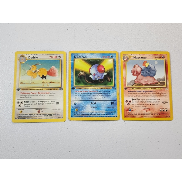 Three 1st Edition Vintage Pokemon Cards: Dodrio 34/64, Tentacool 56/62, & Magcargo 33/64