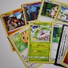 Image 3 : Lot of 10 Assorted Sun & Moon Base Set Pokemon Trading Cards Including Code Card