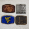 Image 1 : Four Assorted Vintage Collectible Belt Buckles Ft. JOY, Kennametal, West Virginia & Northern Coal Co