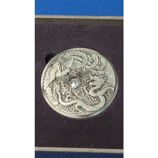 2024 1 Oz Silver Dragon & Phoenix Antiqued Coin With Rotating Planchet Window - New Century Mint