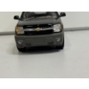 Image 1 : Welly 1:24 scale diecast model of a 2002 Chevrolet Avalanche pickup truck 