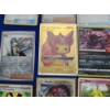 Image 4 : Lot of 31 Assorted Pokémon Trading Cards Including Gold-Foil Card - See Photos! 