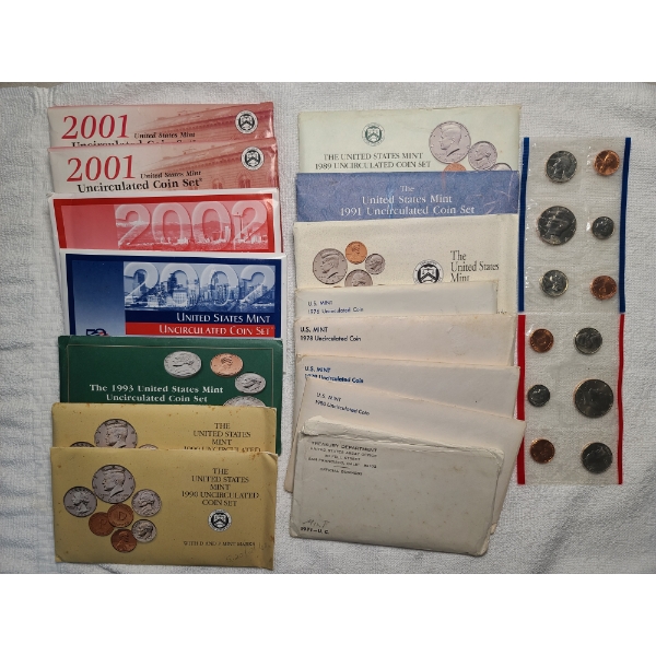 17 Sleeves of Assorted UC Coin Sets from Various Years