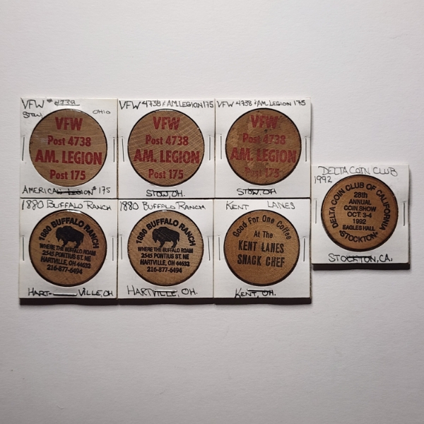 Seven Assorted Wooden Nickels From Hartville, Kent & Stow Ohio Along With California Coin Club!