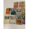 Image 3 : 15 Pokémon Cards - Includes 035/202 Cinderace Rare (2) - Roselia 014/196 - Nacli 101/182 - Cottonee 