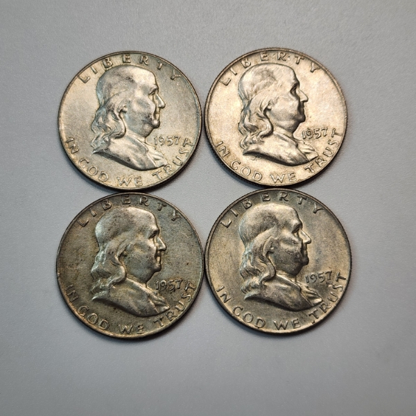Four 1957-D United States 90% Silver Franklin Half Dollars - FV: $2.00