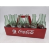 Image 2 : Great Condition 12 Coke Bottles And Plastic Carrier