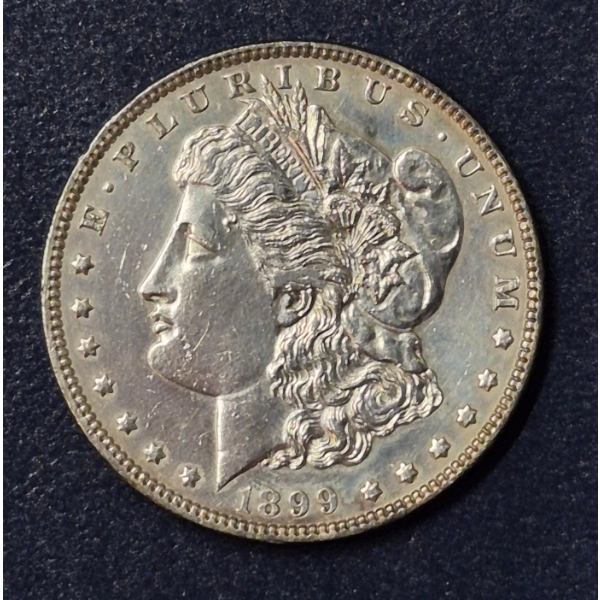 Rare US Morgan Silver Dollar - 1899 P High AU Grade Condition With Slight Edge Toning