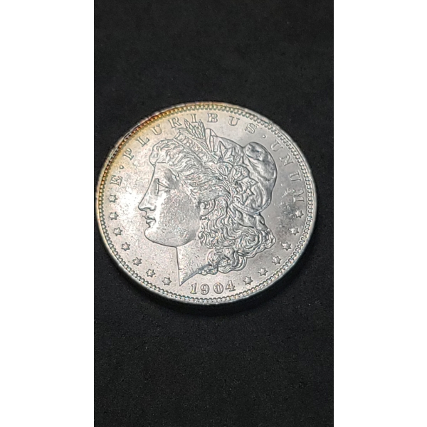 1904-O Silver Morgan Dollar - BU Condition With Light Toning On Rim