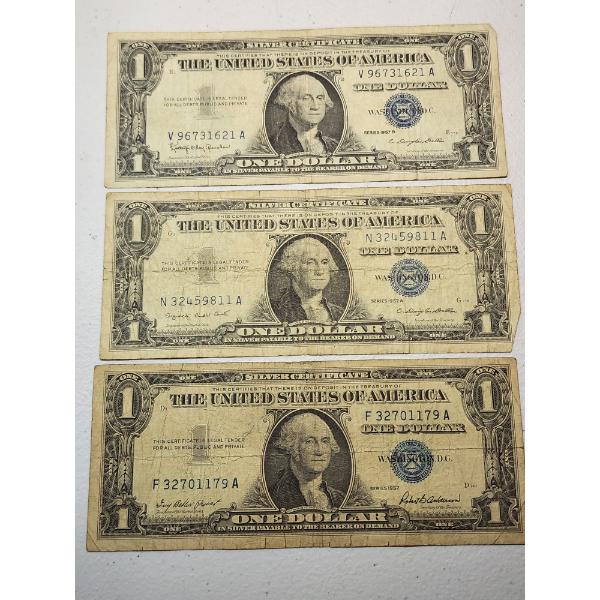 Three 1957 United States Silver Certificates