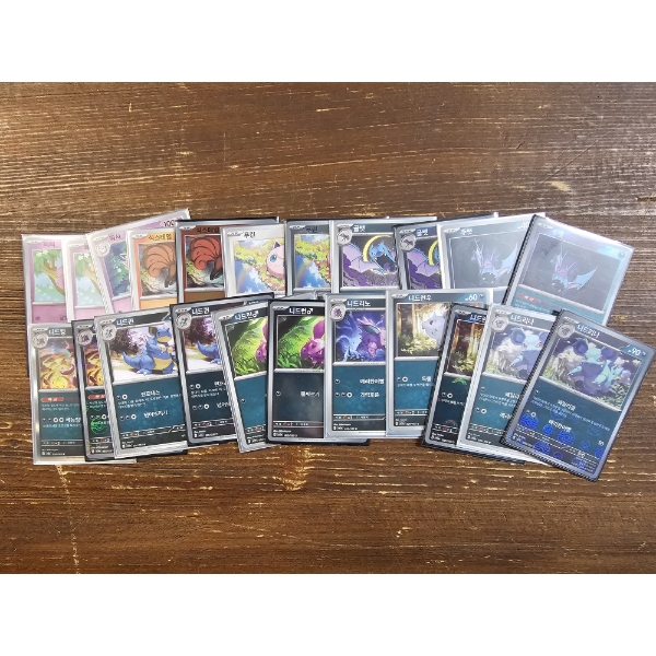 Assorted Foreign Pokemon Trading Cards Featuring Holo, Reverse Holo's & Rares!