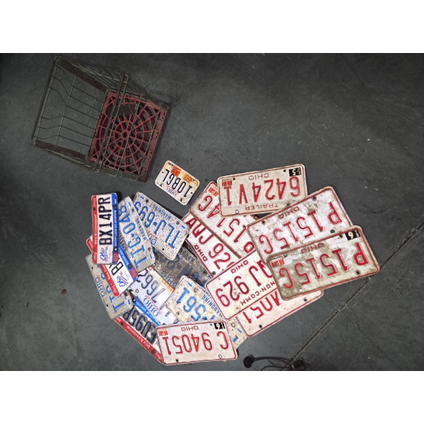 Old License Plate Collection In Metal Crate