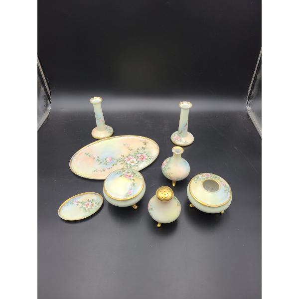 Antique hand-painted porcelain dresser/vanity set with a soft light green and pastel pink floral 