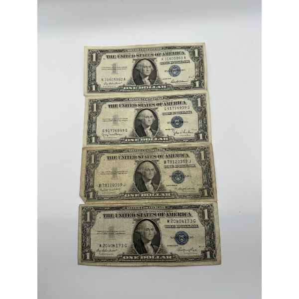 Four U.S. One Dollar Silver Certificates
