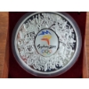 Image 2 : BREATHTAKING Sydney 2000 Olympics Masterpiece KILO SILVER ROUND in Protective Case & Wooden Display