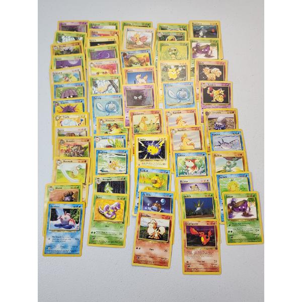 Over 50 Assorted Vintage Pokemon Trading Cards