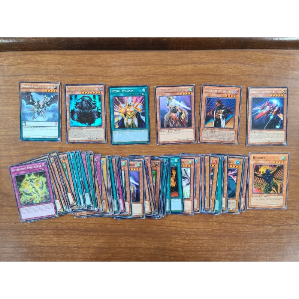 Lot of over 60 Assorted Yu-Gi-Oh Trading Cards Including Holo's