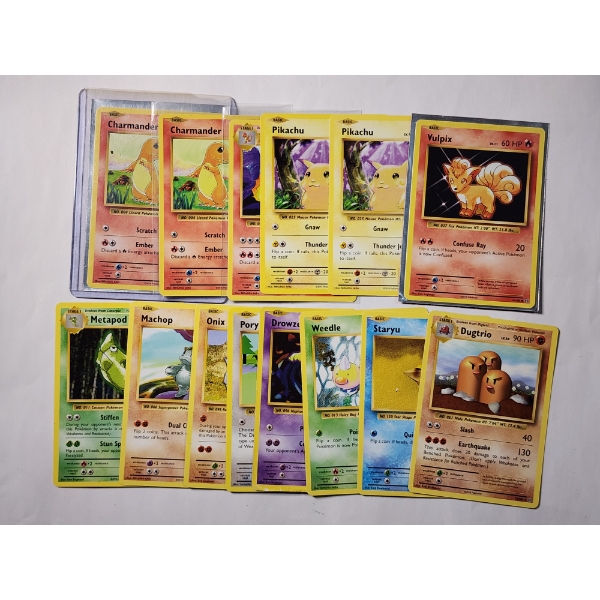 14 Assorted 2016 Vintage Pokemon Trading Cards Including Pikachu, Charmander & More