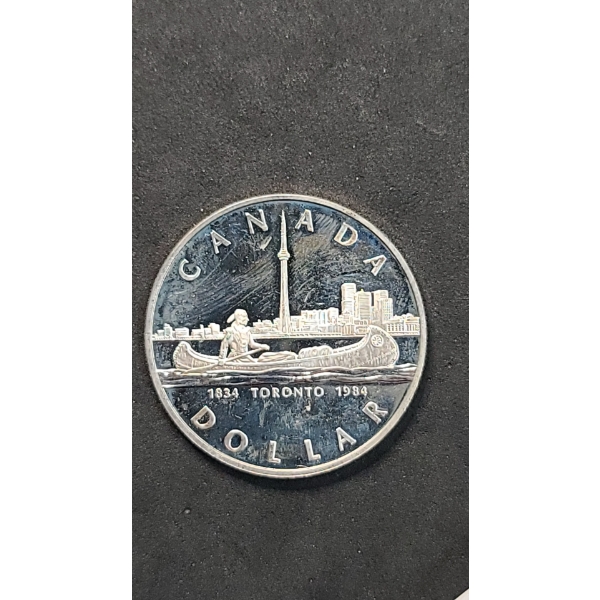 1984 Canadian 150th Anniversary (Sesquicentennial) Of Toronto 50% Silver Dollar - ASW: 0.375oz