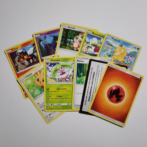 Lot of 10 Assorted Sun & Moon Base Set Pokemon Trading Cards Including Code Card