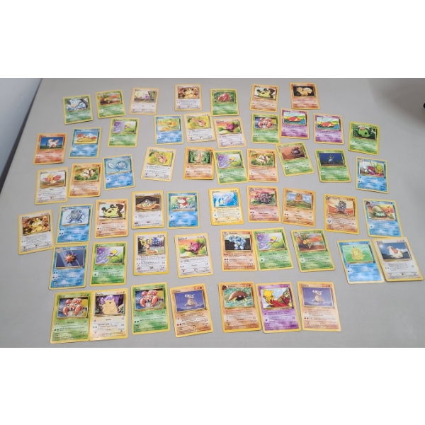 Large Assortment Of Pokémon Trading Cards Including Some Vintage