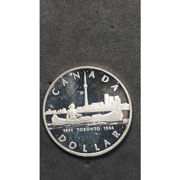 1984 Canadian 150th Anniversary (Sesquicentennial) Of Toronto 50% Silver Dollar - ASW: 0.375oz