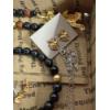 Image 5 : Lot of Costume Jewelry - Necklaces - USA Eagle Pin - Cross Necklace - Christmas Earrings