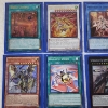 Image 5 : Eight Assorted Yu-Gi-Oh Trading Cards In Sleeves ~ Many Holo's!
