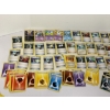 Image 2 : Tin of Tons of Pokémon Cards - Servine - Emolga - Pikachu- Sandile - Etc.