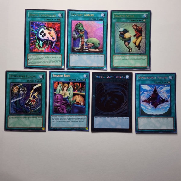 Seven Assorted Magic/Spell Card Holo Rare Yu-Gi-Oh Trading Cards ~ NM Condition