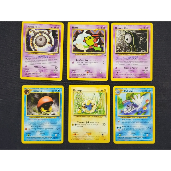 Lot of Six Assorted Neo Discovery Pokemon Trading Cards Including Unown & Poliwhirl