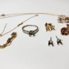 Image 2 : Lot of Assorted 14K Gold Jewelry: Earring Pairs, Rings, Scrap Chains - TW: 7.2g