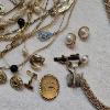 Image 5 : Vintage Costume Jewelry Lot features a Mix of Gold-Toned Chains, Necklaces, and Accessories