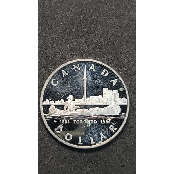 1984 Canadian 150th Anniversary (Sesquicentennial) Of Toronto 50% Silver Dollar - ASW: 0.375oz