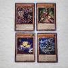 Image 1 : Four Assorted Holo Yu-Gi-Oh Trading Cards!