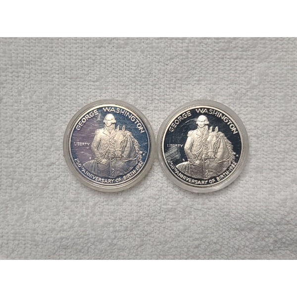 Two 90% Silver Washington Commemorative Half Dollars in Plastic Protectors