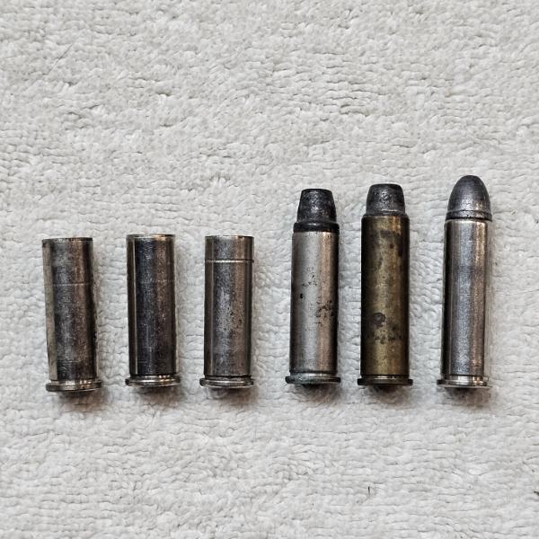 Assorted Handgun Ammunition Lot Containing 3 Empty/3 Live Rounds