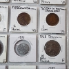Image 10 : Two Binder Pages Filled with Assorted World Coins: Ireland, Russia, Great Britain, Isreal, & More! 