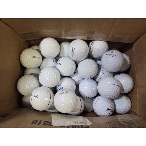 Sixty Four Used Golf Balls