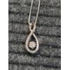 Image 8 : Beautiful Sterling Silver Pendant & Chain Featuring 32 Natural Diamonds - Approx. .12 Carat 
