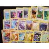 Image 2 : Large Lot of 50 Pokemon Trading Cards Including Reverse Holo's & Rares!